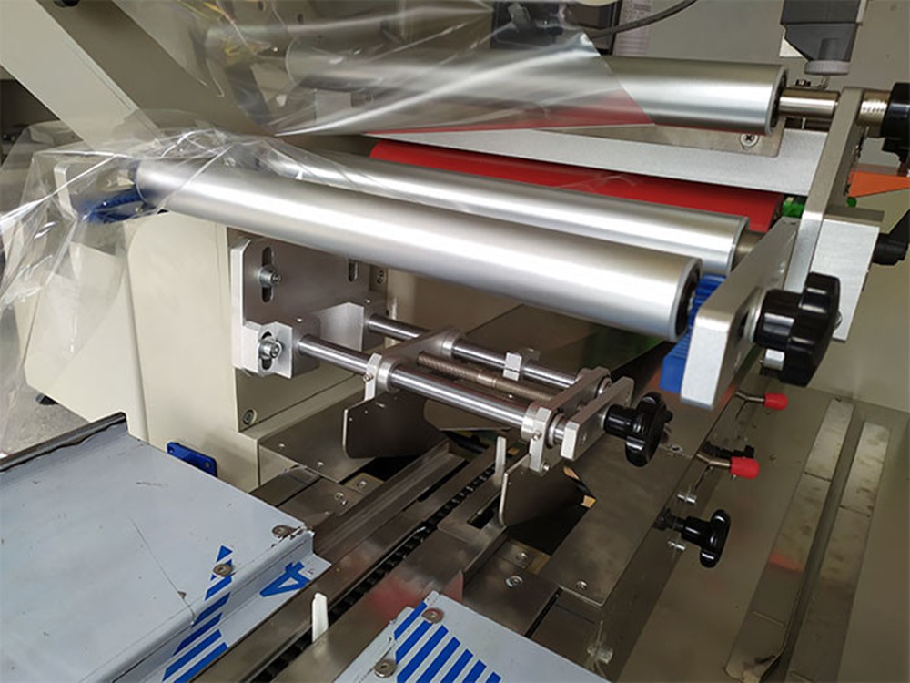 枕式自动91麻豆免费视频网站拉膜机构